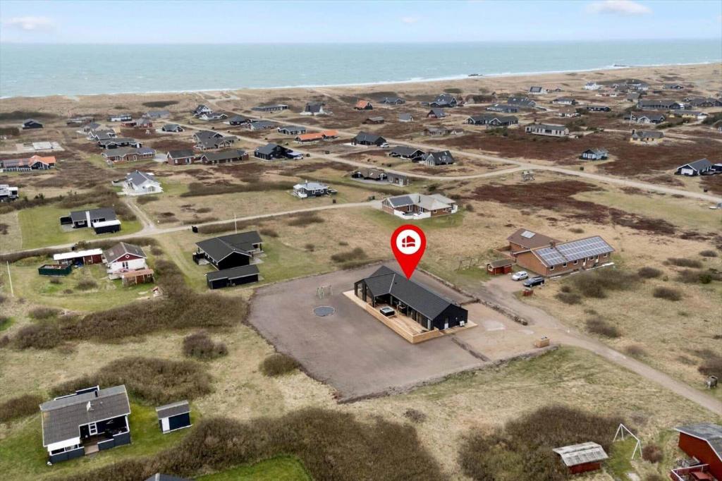 an aerial view of a camp site with a red sign at 394-Harboore-Hermodsvej-8 in Harboør