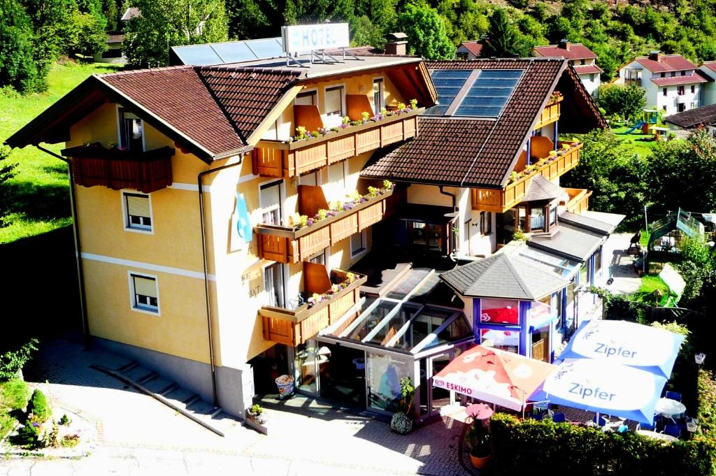 an overhead view of a house with a lot of windows at Hotel Gletschermühle in Flattach