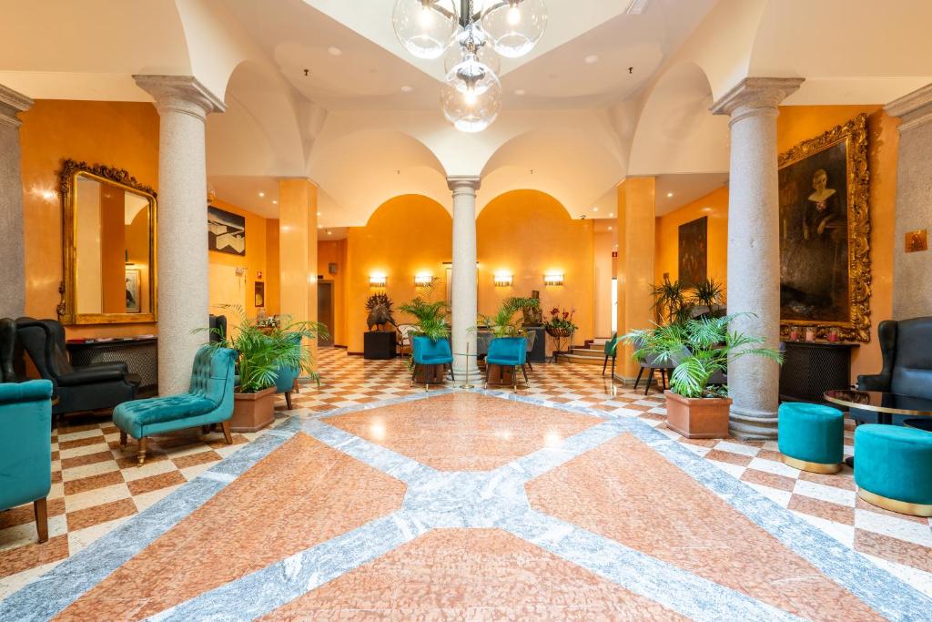 a lobby with a star on the floor at Hotel Regina in Milan