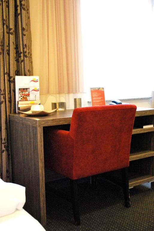 Postel nebo postele na pokoji v ubytování Hotel Dietrichsdorfer Hof