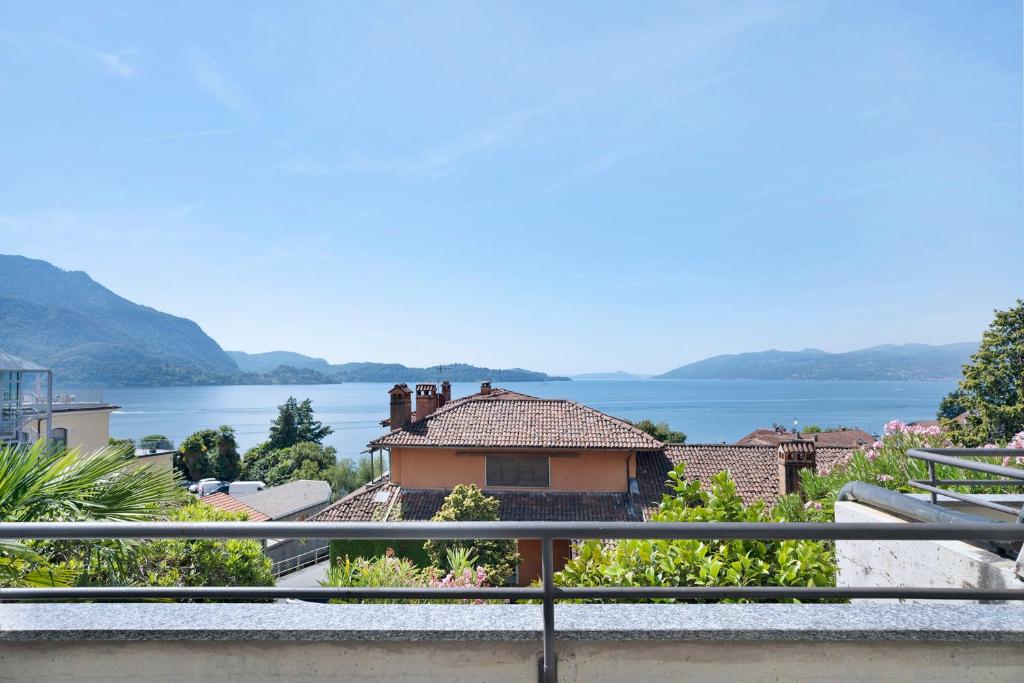a house with a view of the water at Appartamento Vista Lago Ghiffa in Ghiffa