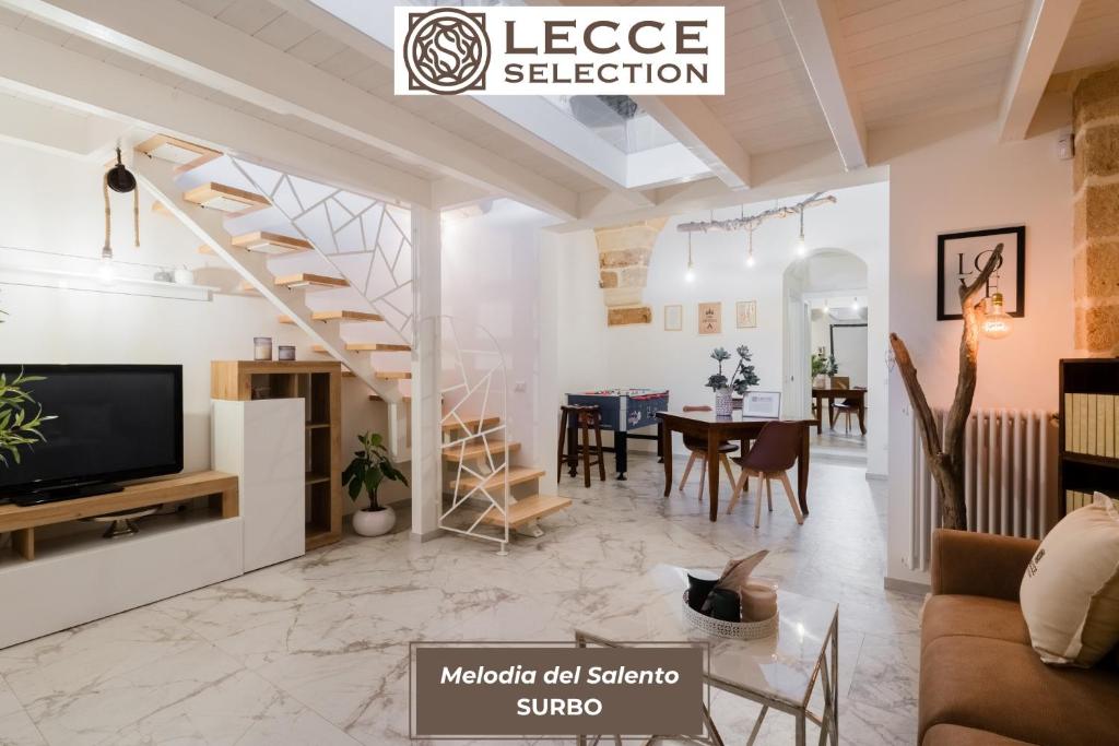 a living room with a television and a dining room at Melodia del Salento - Lecce Selection in Surbo