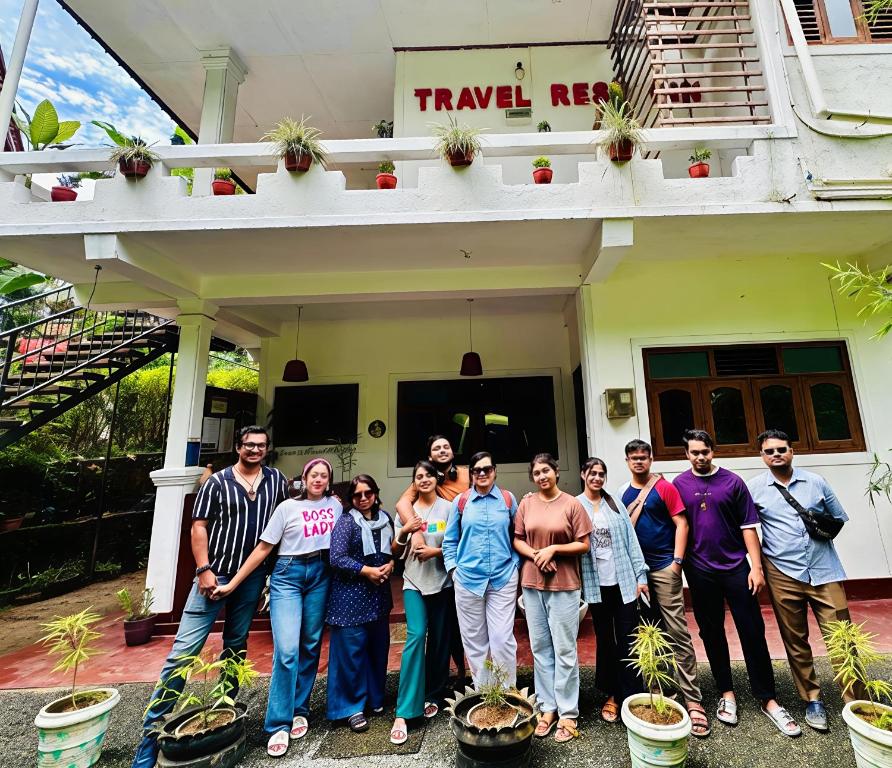a group of people standing in front of a house at Ella travel rest inn in Ella