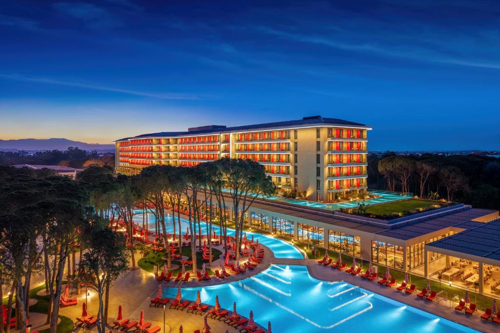 an overhead view of a building with a pool at Trendy Perge Resort & Suites in Aksu