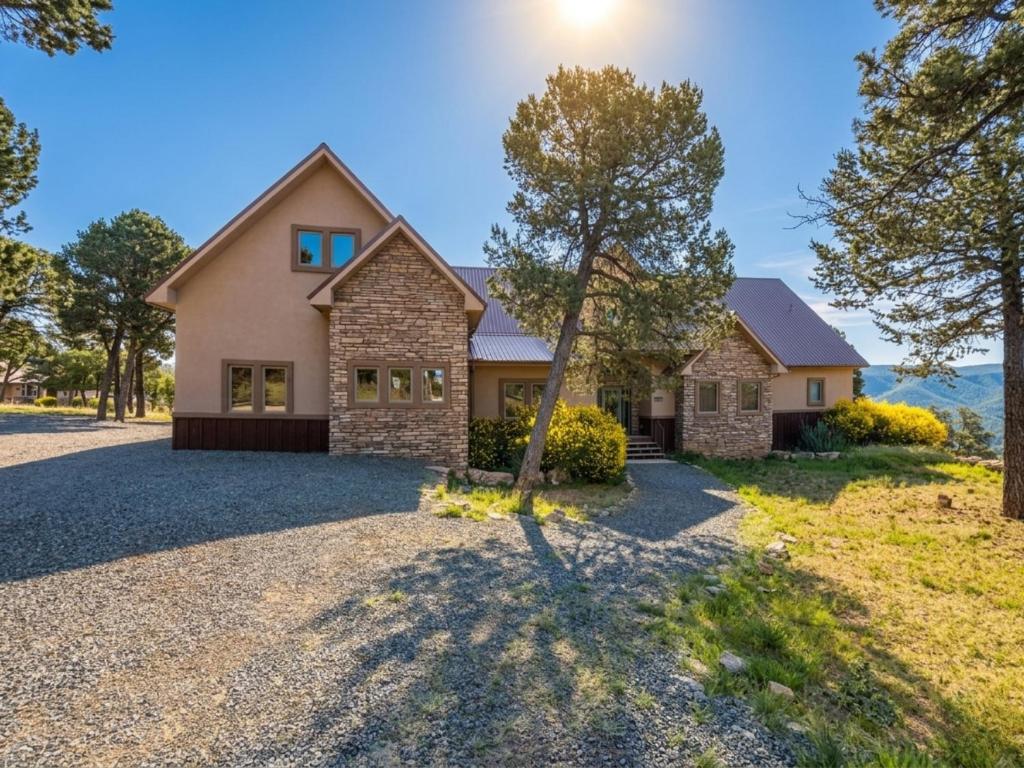 a home with a large driveway at Avalon in Ruidoso