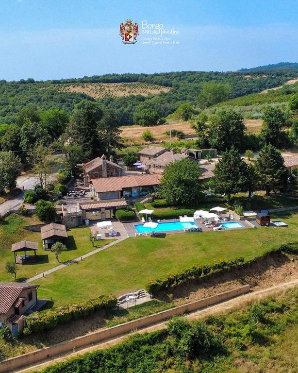 a kite flying in the sky over a resort at Borgo San Faustino Country Relais and Spa Orvieto in Orvieto