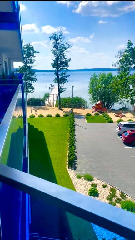 a view of the ocean from a balcony at Aquarius Residence apartament 203 in Boszkowo