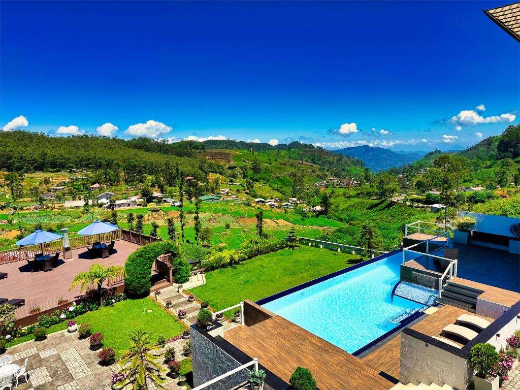 an aerial view of a resort with a swimming pool at Hilldale Retreat in Nuwara Eliya