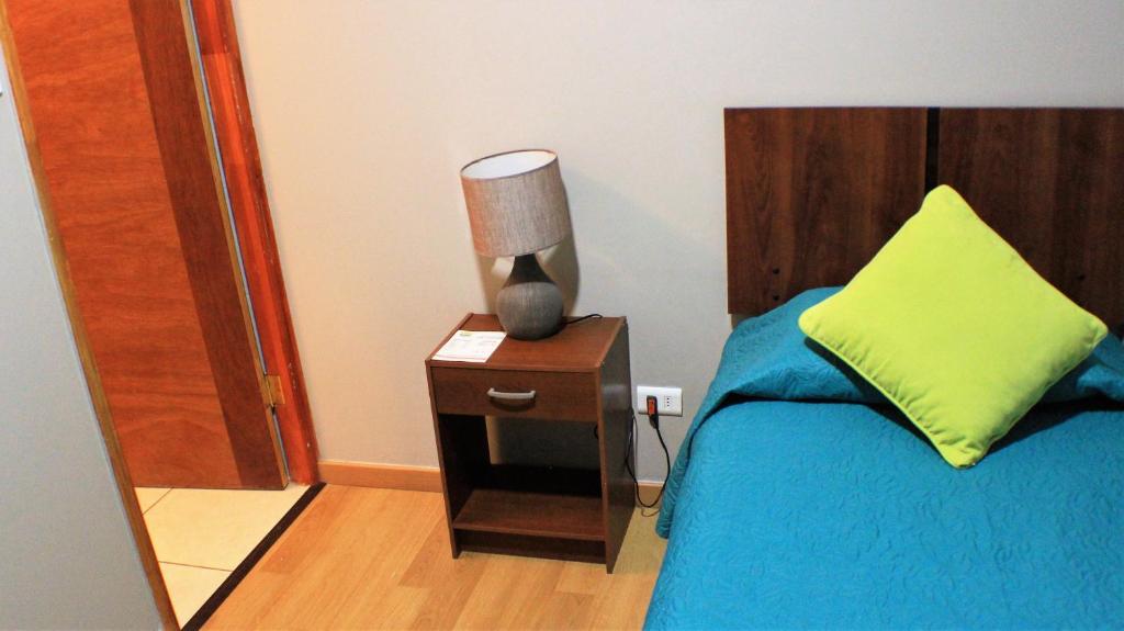 Postel nebo postele na pokoji v ubytování 914 Hotel