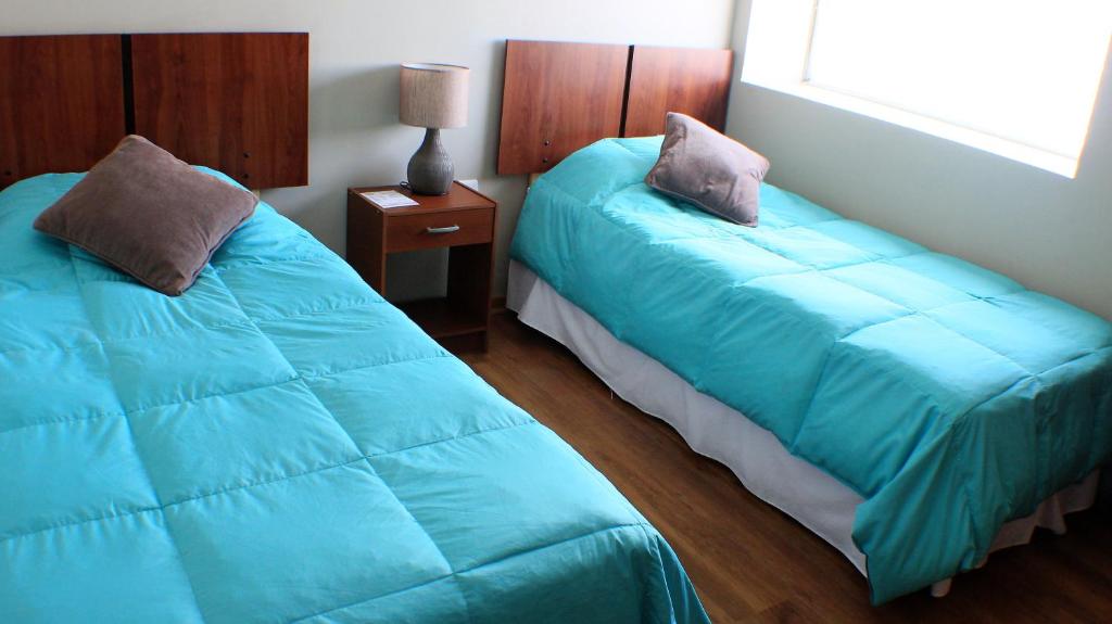 Postel nebo postele na pokoji v ubytování 914 Hotel