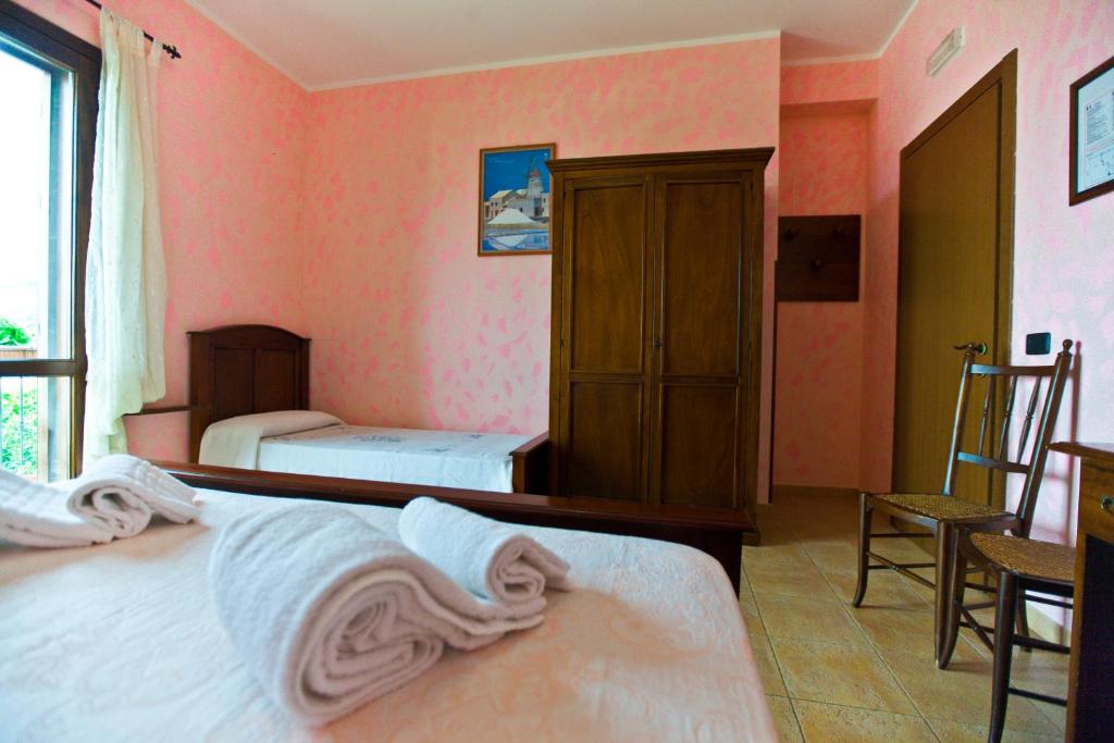 Postel nebo postele na pokoji v ubytování History Hotel