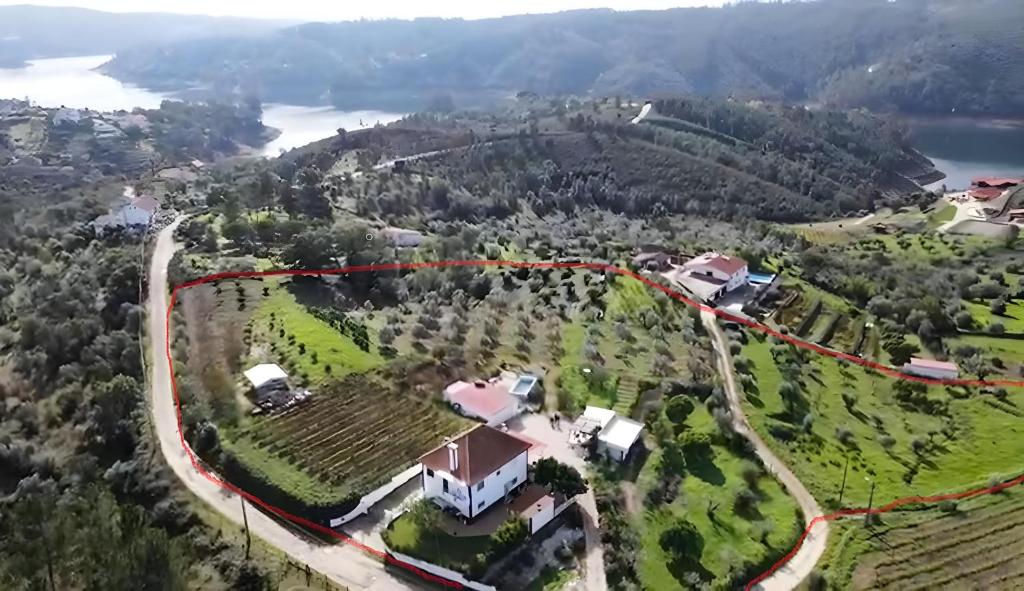 an aerial view of a house on a hill at Casa da Lameira in Serra