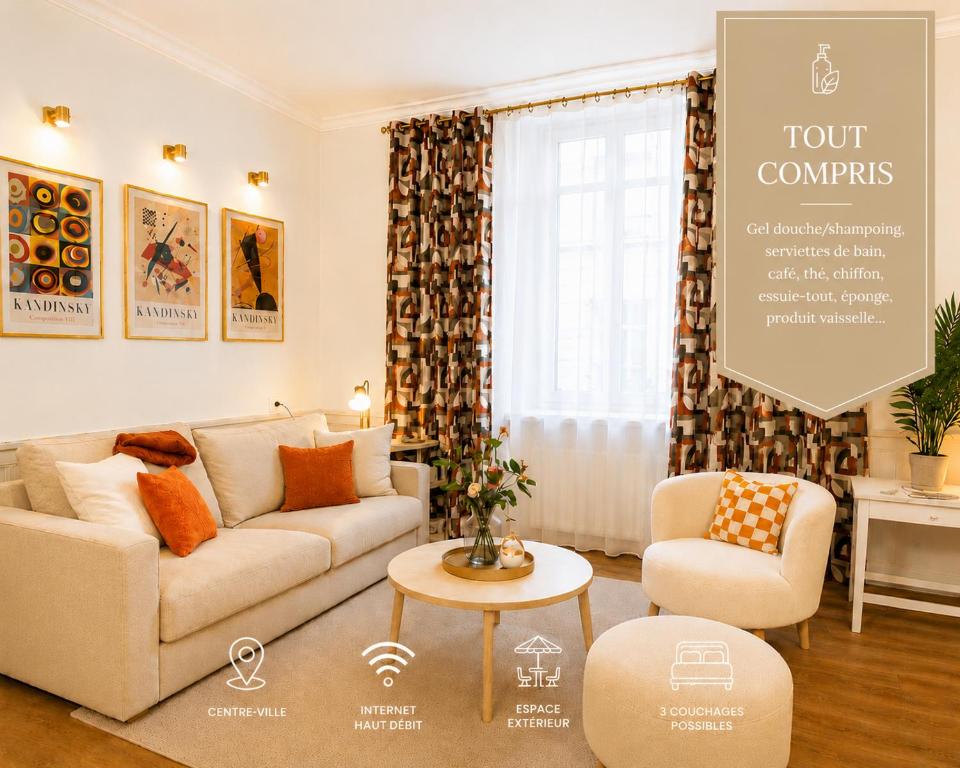 a living room with a couch and a table at Le Haussmann - Centre Historique, Chic & Terrasse in Saint-Brieuc