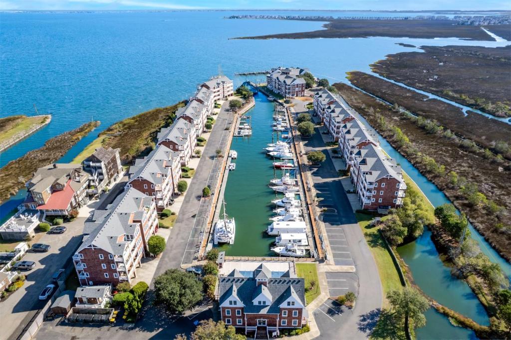 an aerial view of a marina with boats at SBC1001 - Sweet Retreat in Manteo