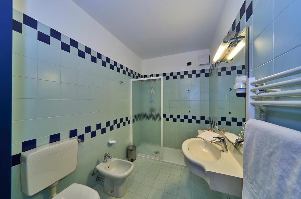 Koupelna v ubytování Hotel Alberi
