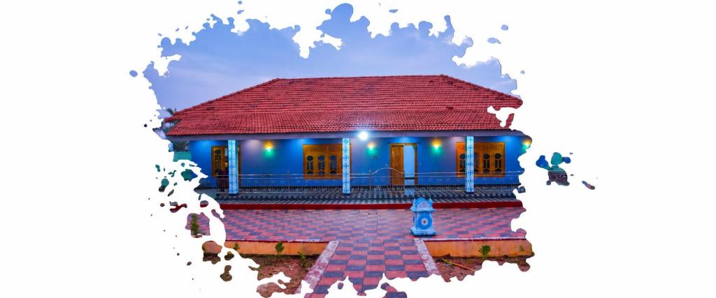 a model of a house with a red roof at Vickys villa in Kuppilan