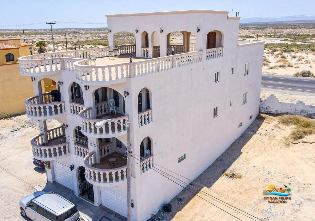 an aerial view of a white house with balconies at Jerry in San Felipe