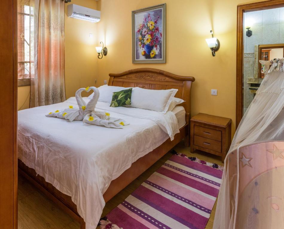 Postel nebo postele na pokoji v ubytování Blue Pearl Resort