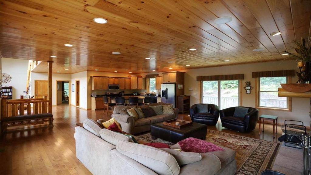 a large living room with a couch and chairs at Welch View 41 Thornton Private Home Close to Waterville Valley in Thornton