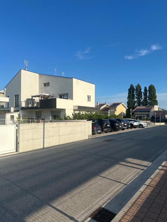 an empty street in front of a building at jesolo wellness house in Lido di Jesolo