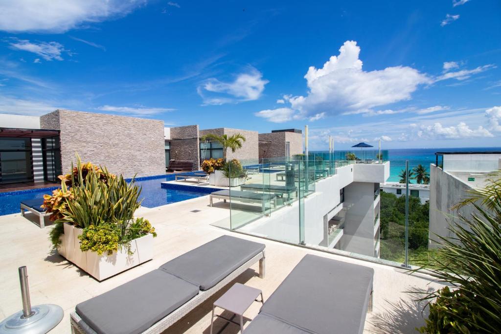 an image of a house with a view of the ocean at Depa MAJUM Playa del Carmen in Playa del Carmen