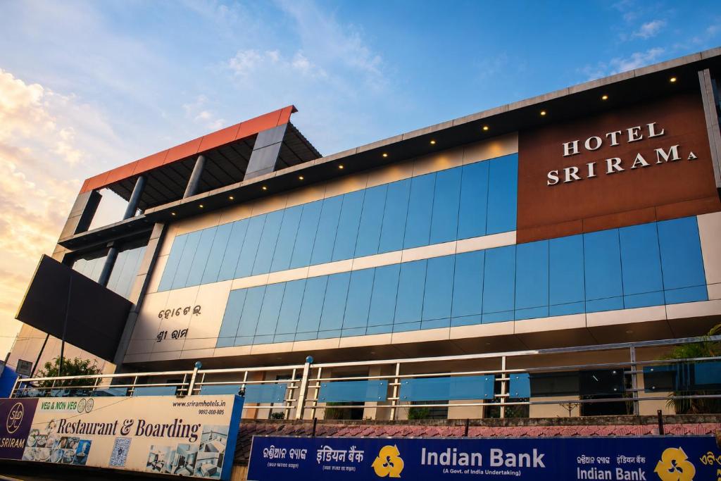 an indian bank building with a sign on it at Hotel Sri Ram in Similigurha