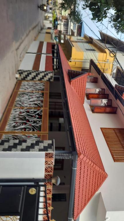 an overhead view of a building with red roofs at Kasi Heritage Home Near Sree Padmanabha Swami Temple 800m in Trivandrum