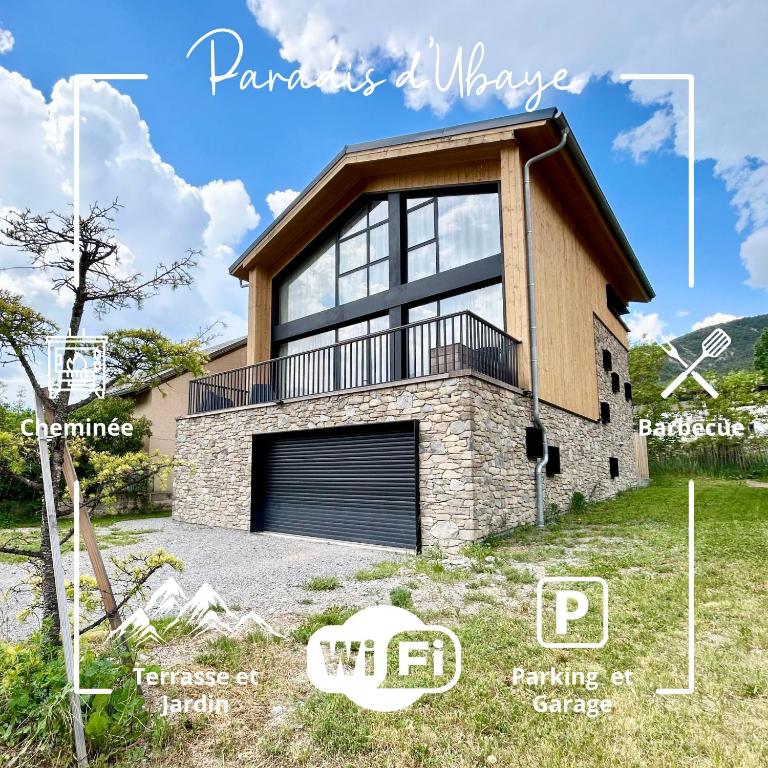 a house with a garage in front of it at Paradis d'Ubaye - Terrasse - Plan d'eau - Jardin in Jausiers