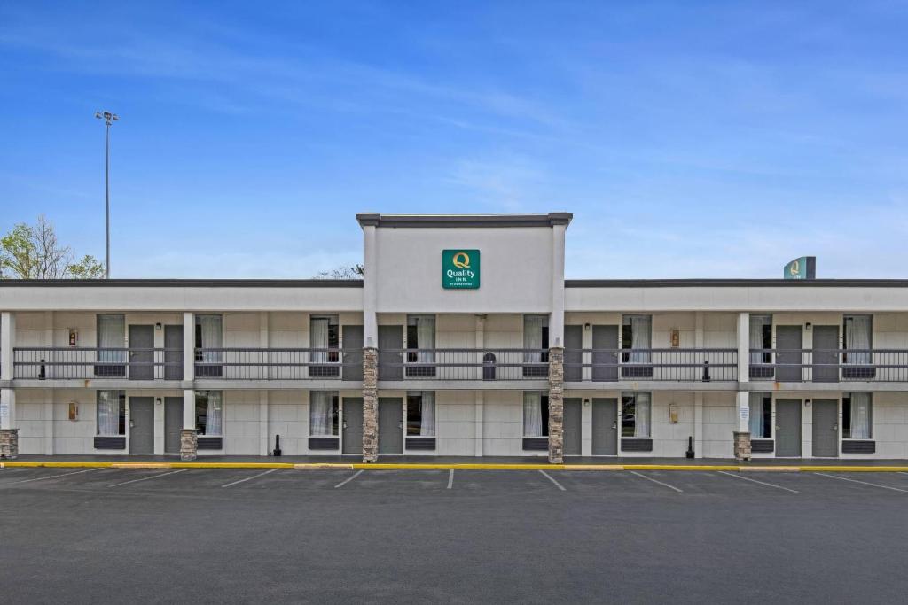 a parking lot in front of a hotel at Quality Inn Dalton East in Dalton