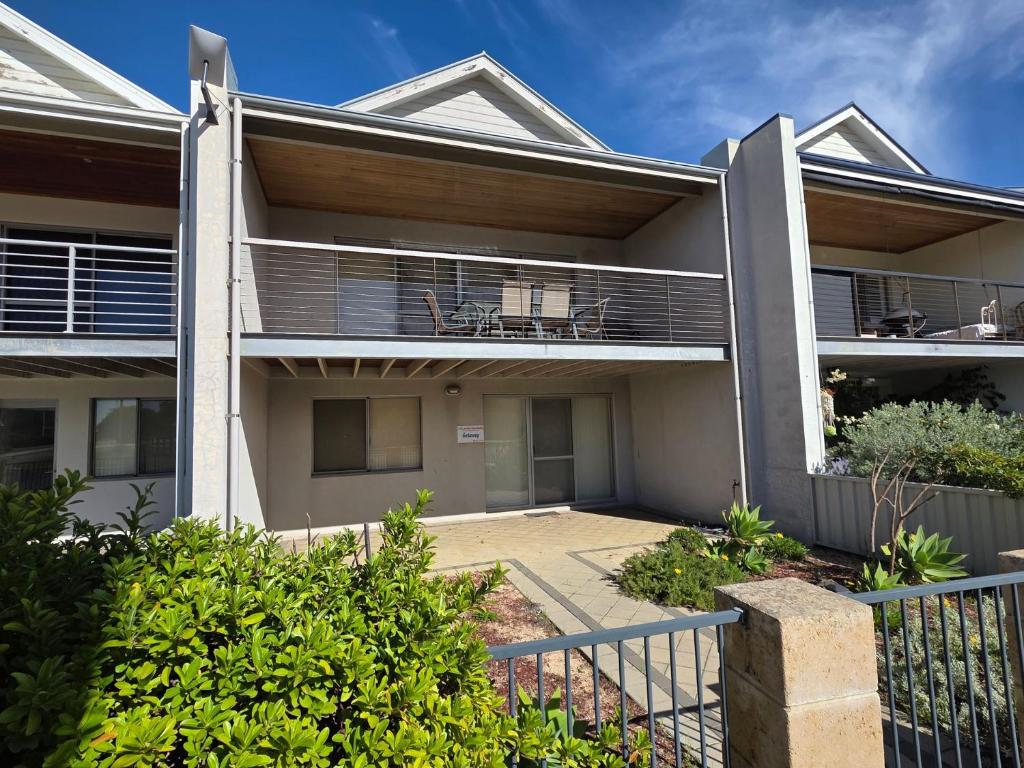an image of a house with a balcony at Getaway, Unit 20 Seafront Estate in Jurien Bay