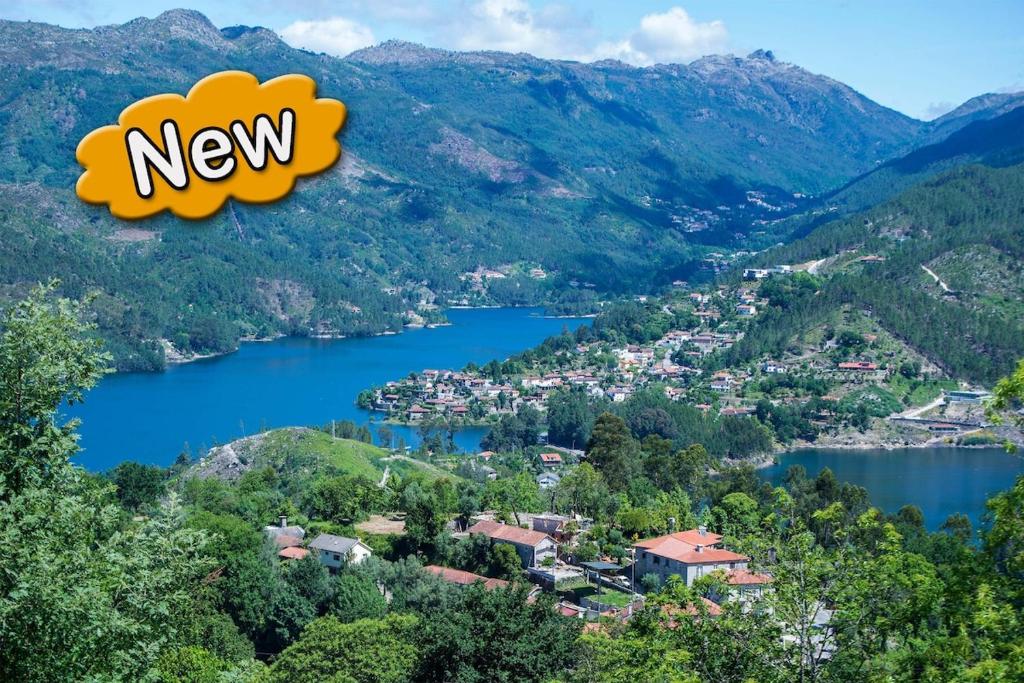 a view of a town and a lake at Welcome to Gerês in Ventosa