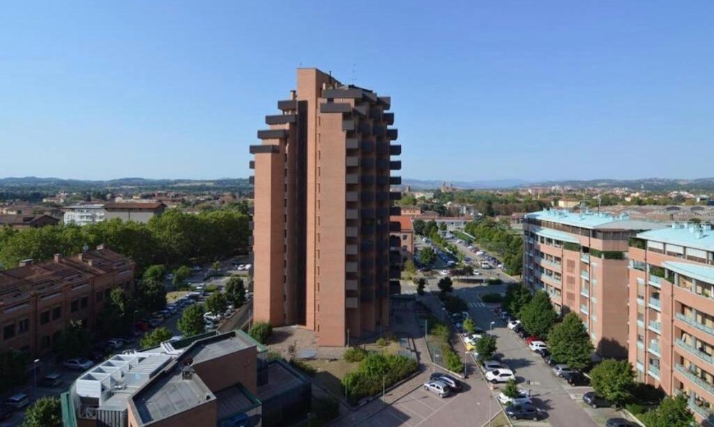 an overhead view of a tall building in a city at La CASA DI ALE in Imola