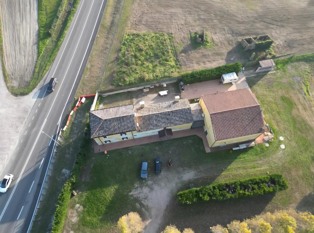 an aerial view of a house with a road at Residence Oasi del Delta in Taglio di Po