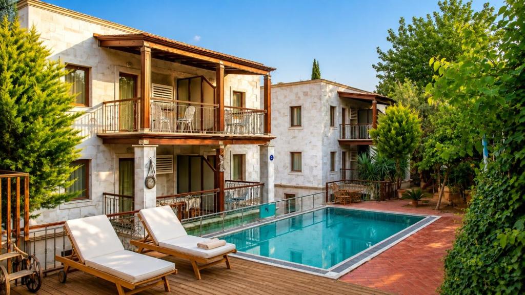 an image of a house with a swimming pool at Bodrum Stone House Hotel in Bodrum City
