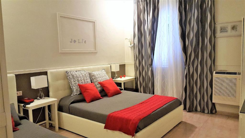Postel nebo postele na pokoji v ubytování Hotel Velcamare