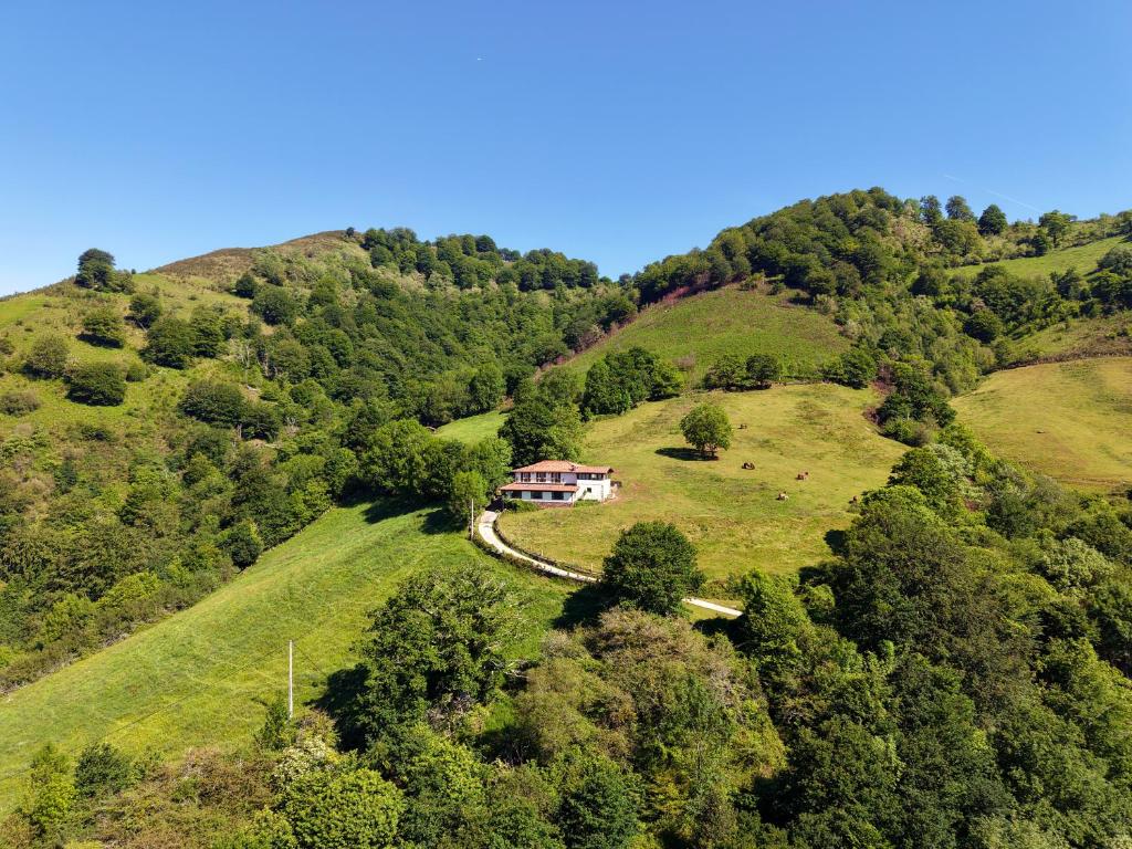 a house on the side of a hill at Casa Rural Istikot in Errazu