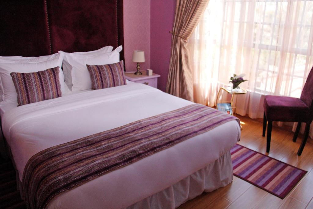 Voodi või voodid majutusasutuse Salmiya Place toas