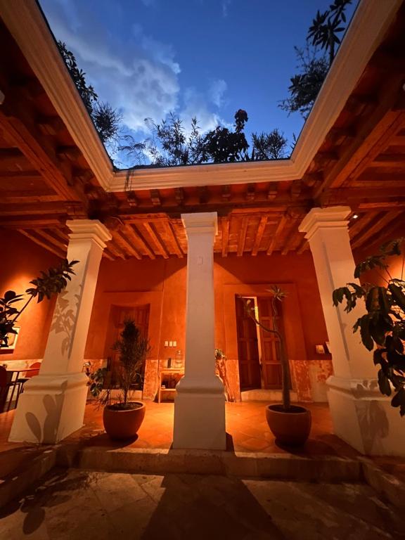 a large building with columns and a ceiling at Jr-Kiyo Estudios in Oaxaca City