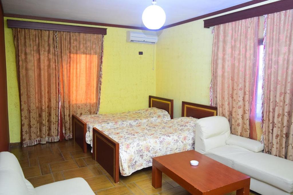 Postel nebo postele na pokoji v ubytování Hotel Deja