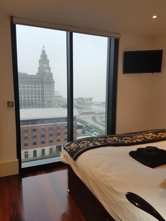 Postel nebo postele na pokoji v ubytování Excelsior Apartments - Liverpool Central - Free Parking - AirCon