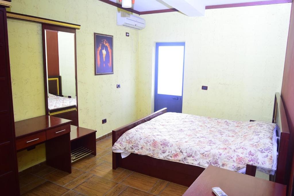 Postel nebo postele na pokoji v ubytování Hotel Deja