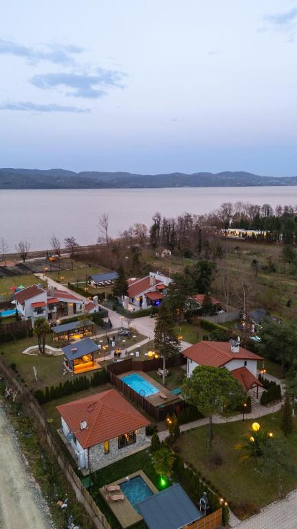an aerial view of a small town by the water at Monk By The Lake Sapanca in Sapanca