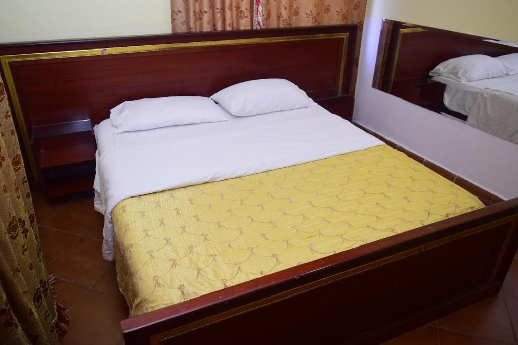 Postel nebo postele na pokoji v ubytování Hotel Deja