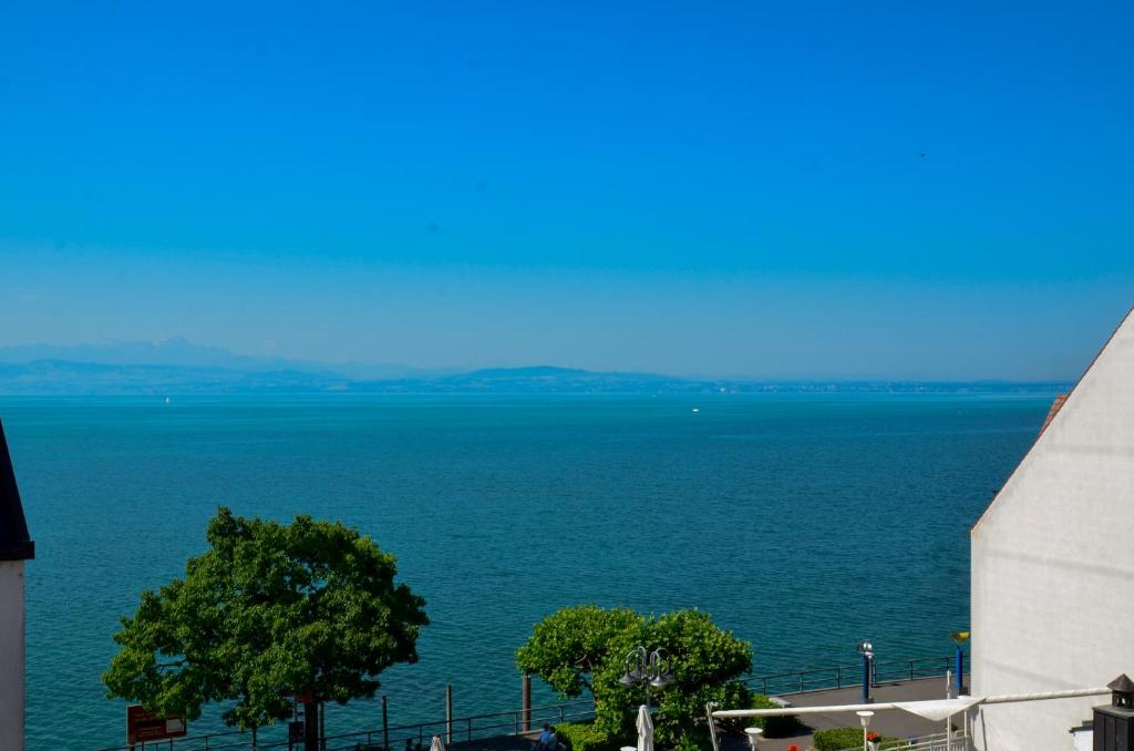 a view of a large body of water at Ferienwohnung NORA - direkt am Bodensee in Friedrichshafen