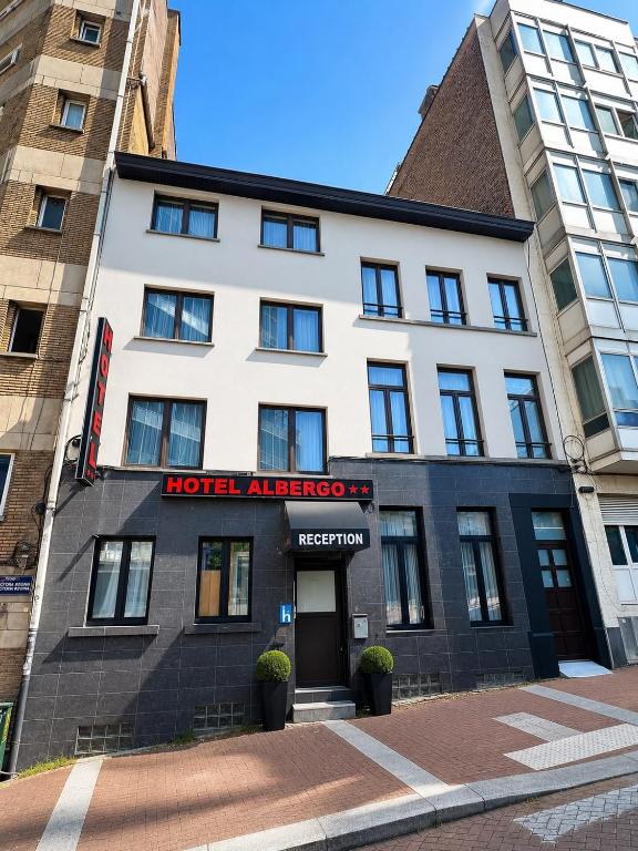 a hotel entrance with a hotel alfred at Hotel Albergo in Brussels