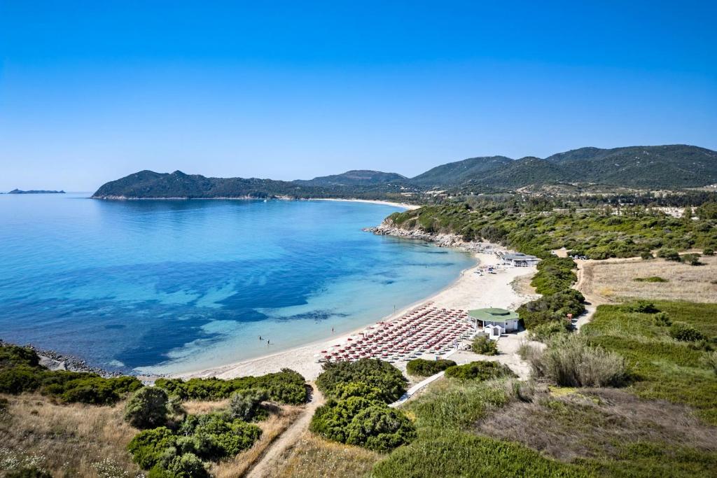 an aerial view of a beach with a resort at Sant'Elmo Beach Hotel in Castiadas
