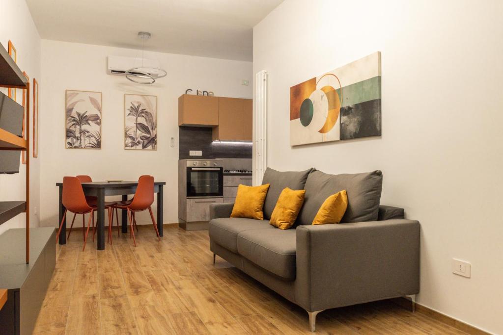 a living room with a couch and a table at La Casa al Centro in Policoro