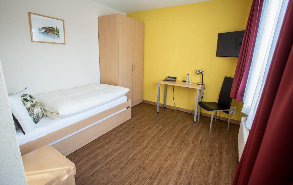 Postel nebo postele na pokoji v ubytování Kessler's Kulm Gästehaus