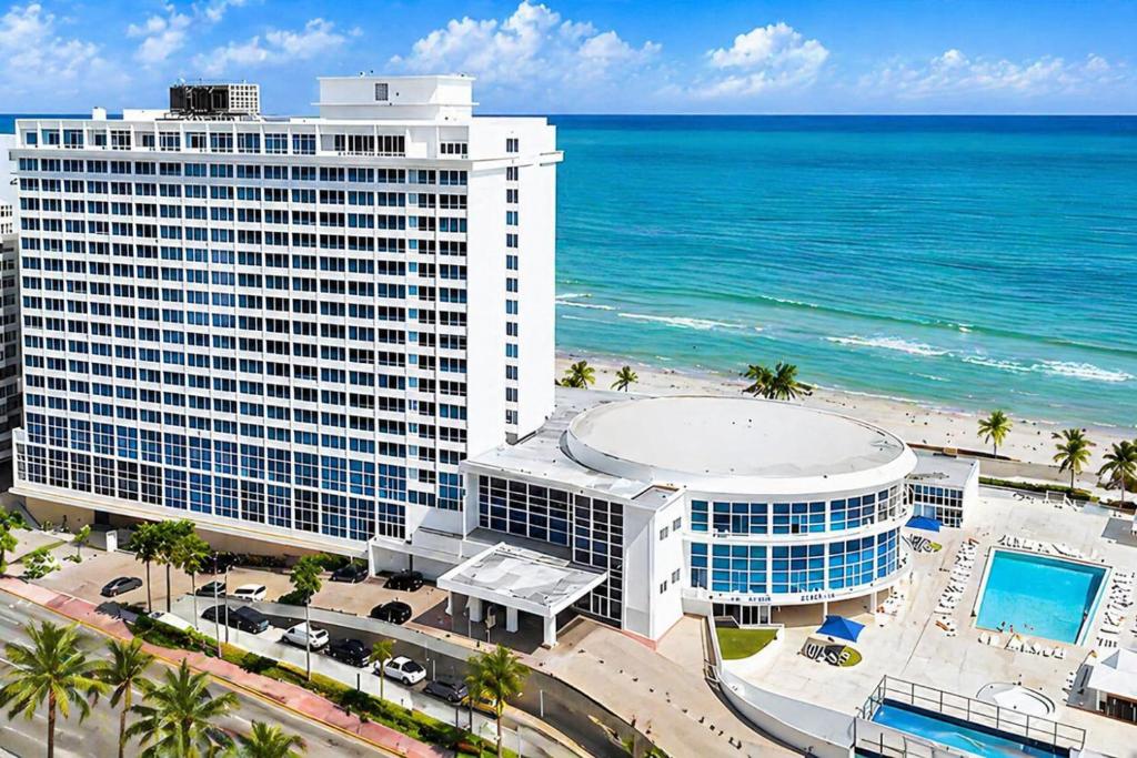 an aerial view of a hotel and the ocean at SeaStays Apartments in Miami Beach
