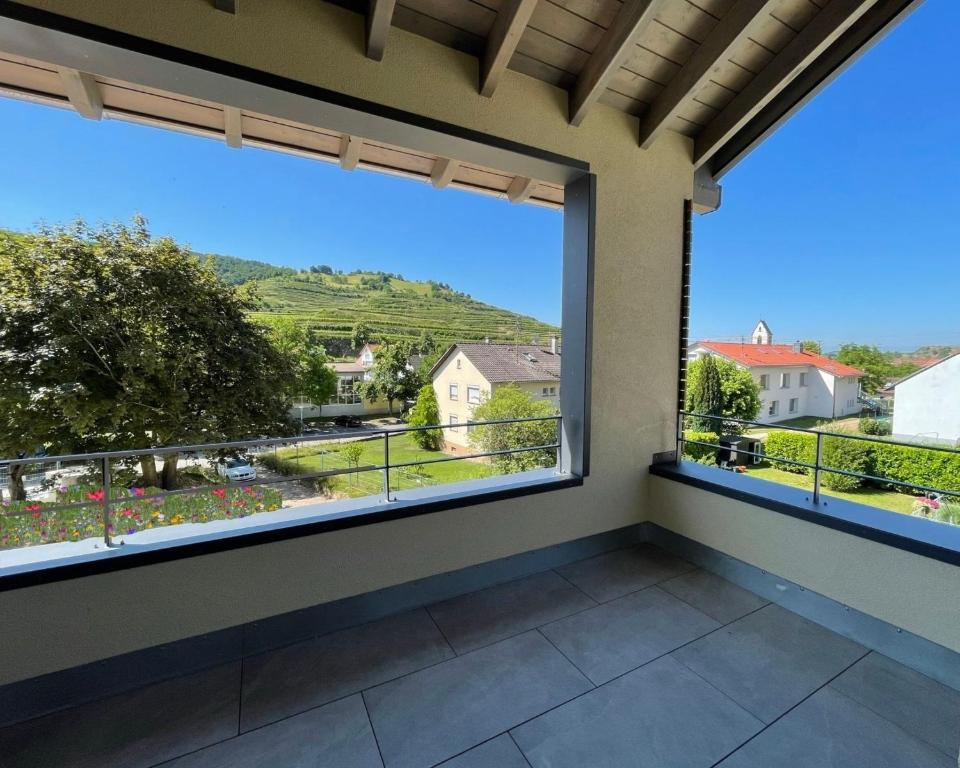 a room with a large window with a view at Apartment Wiedehopf in Vogtsburg